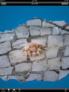 Hypr3D's model viewed rendering a reconstructed model featuring a pile of rocks on an iPad